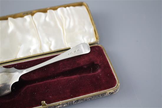 Two 18th century silver berry spoons a George III silver sauce ladle, London, 1773 and a cased silver small server, Sheffield, 190